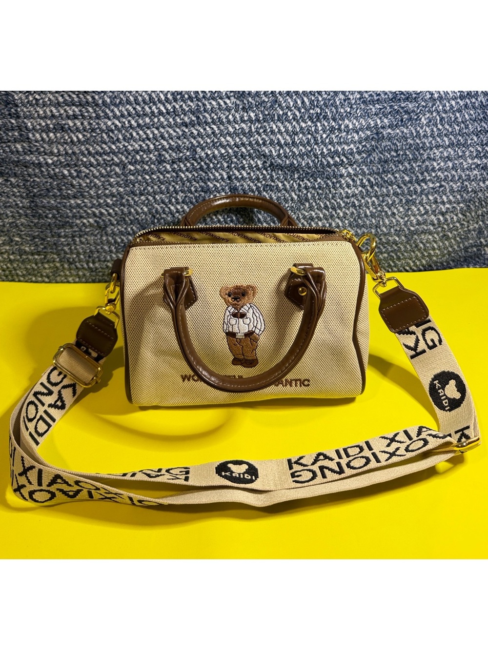 KAIDI Beige Canvas Mini Messenger Bag with Brown Trim and Bear Detail